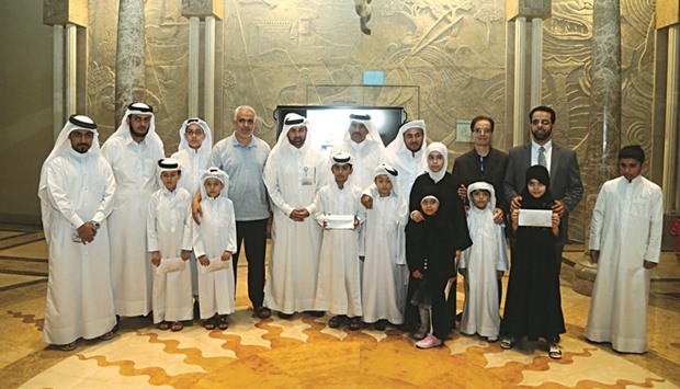 Dr al-Sulaiti with the winners of the contest.