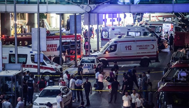 Forensic police pictured at the explosion site at Ataturk airport in Istanbul last month.