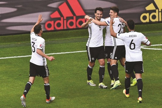 German players celebrate a goal against Slovakia during their Euro 2016 Round of 16 match in Lille on Sunday. (AFP)
