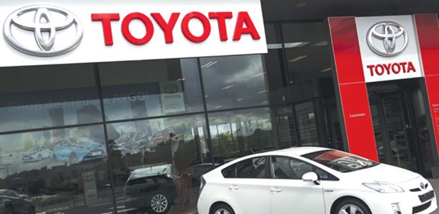 A car on display at a Toyota dealership in the Hague. The Japanese firm yesterday said evaporative fuel emissions control units in models produced from 2006 to 2015 including the Prius, Auris compact hatchback and its popular Corolla models were prone to cracks, which could expand over time and lead to fuel leaks.
