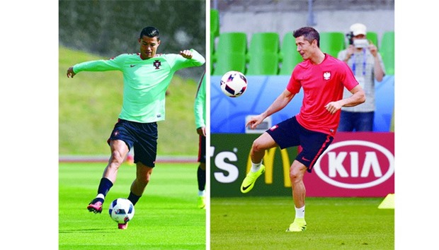 Portugalu2019s Cristiano Ronaldo and Polandu2019s Robert Lewandowski