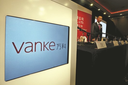 China Vanke president Yu Liang attends a news conference in Hong Kong. The company, embroiled in one of the countryu2019s most-high profile corporate power struggles, received a boost yesterday when its second biggest shareholder said it opposed plans to oust the property developeru2019s board.