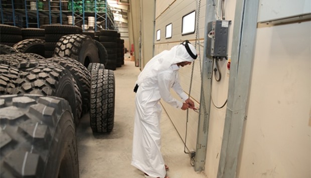 A MEC inspector seals the tyre store in the Industrial Area.