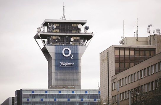 An O2 logo is seen on the transmission tower at the headquarters of Telefonica Czech Republic in Prague. PPF Group owned about 84% of the former phone monopoly as of the end of last year.
