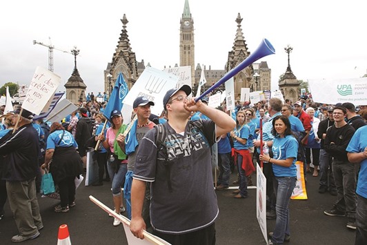 Dairy farmers protest against imported milk products in front of Parliament Hill in Ottawa, Ontario, Canada.