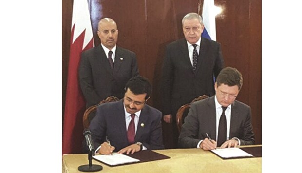HE the Minister of Energy and Industry Dr Mohamed bin Saleh al-Sada, and Russian Minister of Energy Alexander Novak signing the minutes of the meeting.