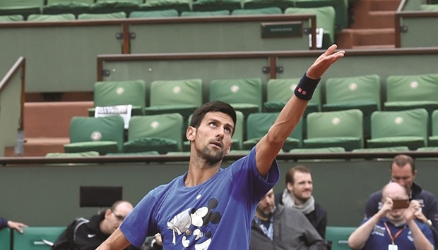 Andy Murray (right) stands between Novak Djokovic and his bid to win a first title in Paris. (AFP)