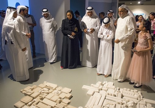 HE Sheikha Al Mayassa bint Hamad bin Khalifa al-Thani with other dignitaries and guests at the exhibition.