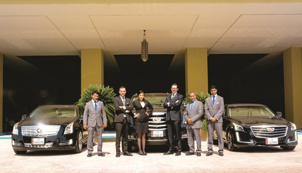 Officials mark the partnership between Grand Hyatt Doha Hotel & Villas and Mannai Auto.