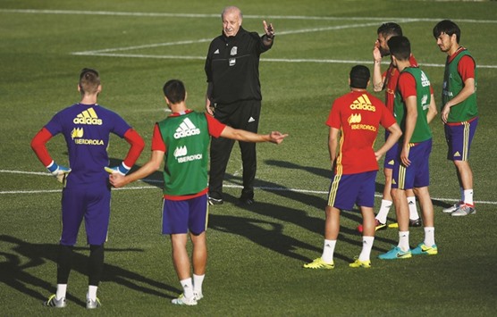 Spainu2019s coach Vicente del Bosque gestures during a training session.