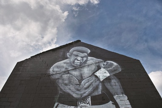 A mural with the image of boxing legend Muhammad Ali is seen in Louisville, Kentucky.