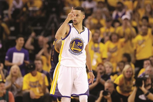 Stephen Curry of the Golden State Warriors reacts during the second quarter of Game 2 of the 2016 NBA Finals against the Cleveland Cavaliers at ORACLE Arena in Oakland, California. (Getty Images/AFP)