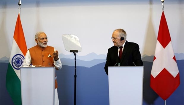 Indian Prime Minister Narendra Modi addresses a news conference with Swiss President Johann Schneider-Ammann after their meetings in Geneva on Monday.