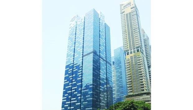 The Asia Square towers (left) in Singapore