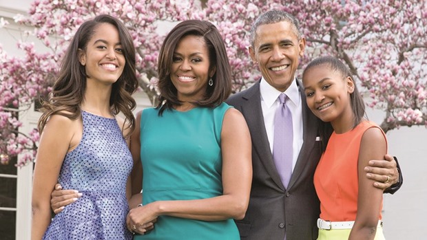 THE OBAMAS: President Barack Obama, First Lady Michelle Obama, and daughters Malia and Sasha pose for a family portrait in the Rose Garden of the White House.