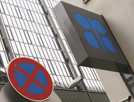 The logo of the Organisation of the Petroleum Exporting Countries is pictured behind a traffic sign at its headquarters in Vienna, Austria on May 30. Far from sending the oil market into gyrations, the run-up to last weeku2019s Opec meeting kept crude pinned near $50 a barrel and sent hedge funds to the sidelines.