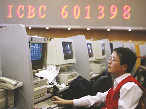 A trader works at the Shanghai Stock Exchange. Even after a 40% tumble in the Shanghai Composite Index over the past 12 months, valuations for Chinau2019s domestic A shares are three times as expensive as every other major market worldwide.