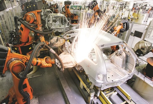 Robot welders work on a Skoda Fabia car body at the companyu2019s plant in Mlada Boleslav, Czech Republic. As part of Volkswagenu2019s u2018Strategy 2025u2019, Skoda is assessing the potential of regions where it does not yet sell cars, including North America, a spokesman at Skoda said yesterday.