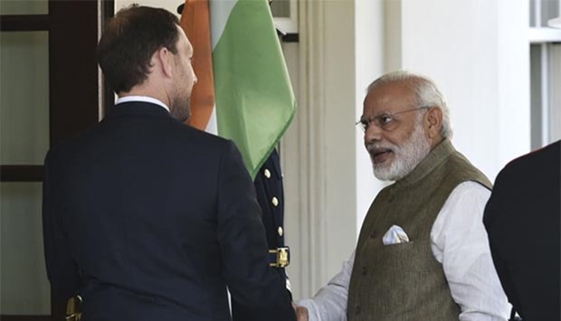 Prime Minister Narendra Modi is greeted by US Chief of Protocol Peter Selfridge upon arrival at the White House in Washington, DC on Tuesday.