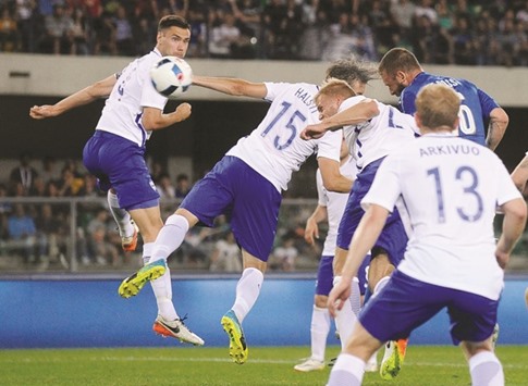 Italyu2019s Daniele De Rossi heads the ball to score against Finland during their match Bentegodi stadium in Verona, Italy, on Monday. (Reuters)