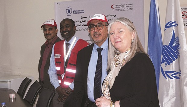 QRCS and WFP officials announce the partnership to help displaced Iraqi families.