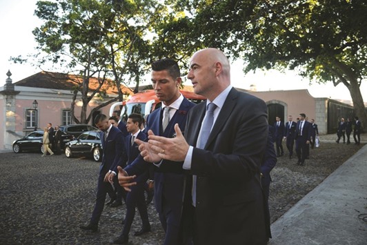 FIFA President Gianni Infantino (right) talks to Portugalu2019s forward Cristiano Ronaldo during a visit at Belem Palace in Lisbon, two days before their departure for the UEFA Euro 2016 in Lisbon. (AFP)