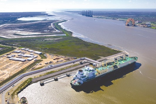 The Asia Vision LNG carrier is docked at the Cheniere Energy terminal in the aerial photo taken over Sabine Pass, Texas, US, on February 24, 2016. Australia and the US will account for 90% of an unprecedented 45% jump in LNG capacity in the six-year period, just as demand stagnates or falls in Japan and Korea, the biggest buyers of the fuel.