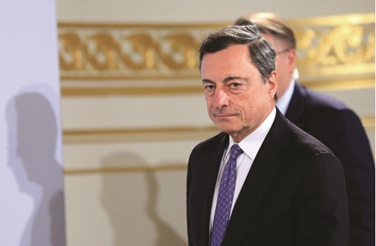 Mario Draghi, president of the European Central Bank, arrives for a news conference to announce the banku2019s interest rate decision in Vienna, Austria, on June 2, 2016. Draghi again urged politicians to step up in efforts to breathe new life into the tepid eurozone economy.