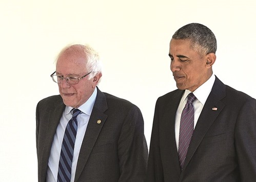 US President Barack Obama walks with Democratic presidential candidate Bernie Sanders to the Oval Office at the White House in Washington, DC.