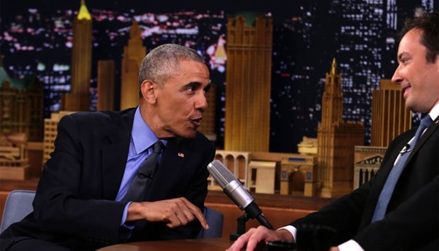 US President Barack Obama speaks with comedian Jimmy Fallon during a taping of the NBC television network's ,Tonight Show with Jimmy Fallon, on June 8, 2016 in New York.