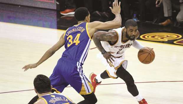 Cleveland Cavaliers guard Kyrie Irving (right) drives past Golden State Warriors guard Shaun Livingston during the second half in game four of the NBA Finals at Quicken Loans Arena in Cleveland, Ohio. PICTURE: USA TODAY Sports