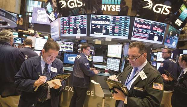 Traders work on the floor of the New York Stock Exchange. A rough few months for most US bank stocks has been particularly unkind to regional banks, and thatu2019s not likely to change soon as hopes dim for higher long-term interest rates and timely policy relief from Washington.