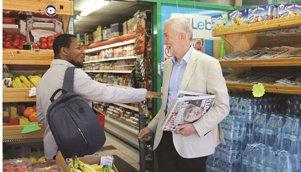 Jeremy Corbyn talks with a shopper in Islington.