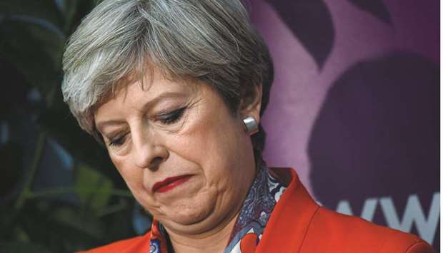 Britainu2019s Prime Minister Theresa May waits for the result of the vote in her constituency at the count centre for the general election in Maidenhead, June 9, 2017.