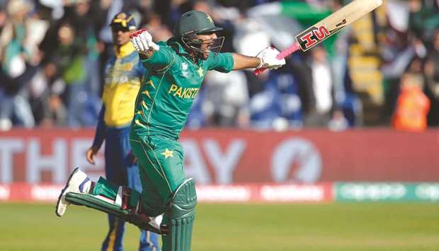 Pakistan captain Sarfraz Ahmed celebrates after scoring the winning runs against Sri Lanka in the ICC Champions Trophy Group B match in Cardiff yesterday. (Reuters)