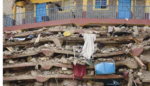 The ruins of seven-storey building is seen yesterday after it collapsed overnight in the Nairobi suburb of Embakasi.