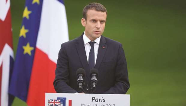 Franceu2019s President Emmanuel Macron speaks during a joint press in the grounds of The Elysee Palace in Paris on June 13.