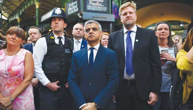 Mayor of London Sadiq Khan attends the re-opening of Borough market in central London yesterday.