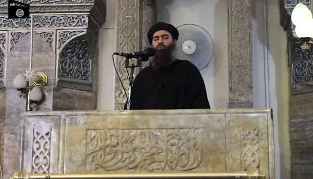 This image grab taken from a propaganda video released on July 5, 2014 by al-Furqan Media allegedly shows the leader of the Islamic State (IS) jihadist group, Abu Bakr al-Baghdadi, aka Caliph Ibrahim, adressing Muslim worshippers at a mosque in the militant-held northern Iraqi city of Mosul.