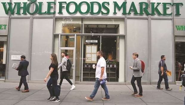 A Whole Foods market in the Manhattan borough of New York City. Amazon has agreed to pay $42 a share in cash for the organic-food chain, including debt, a roughly 27% premium to the stock price at Thursdayu2019s close.