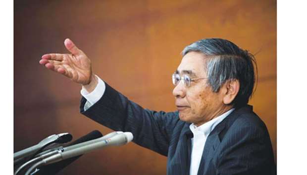 Bank of Japan governor Haruhiko Kuroda at a press conference in Tokyo. The BoJ stood by its pledge to achieve moderate inflation by keeping its policy unchanged yesterday amid growing calls on it to spell out a plan to end monetary easing.