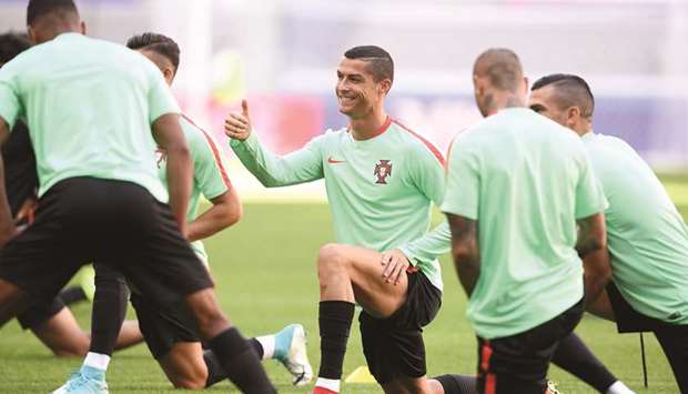Portugalu2019s forward Cristiano Ronaldo gestures during a training session at the Kazan Arena stadium in Kazan, Russia, on the eve of the Russia 2017 Confederations Cup football match Portugal vs Mexico. (AFP)