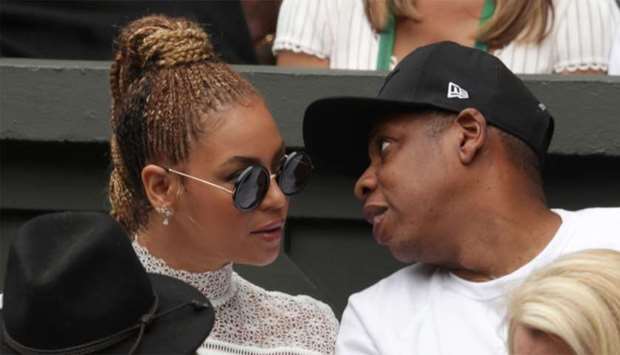 US singer Beyonce (L) and her husband US rapper Jay Z (R)