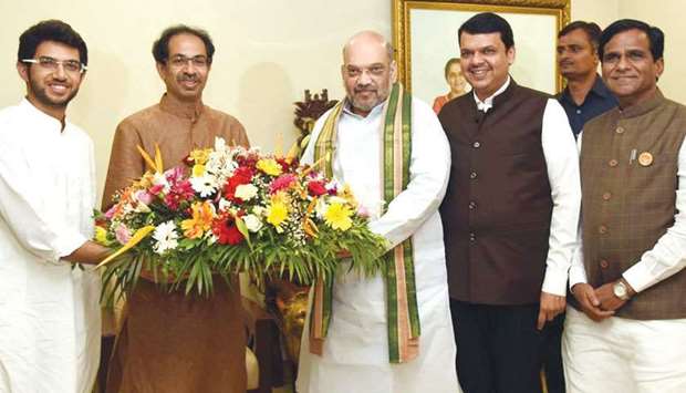 BJP chief Amit Shah being welcomed by Shiv Sena president Uddhav Thackeray in Mumbai yesterday.