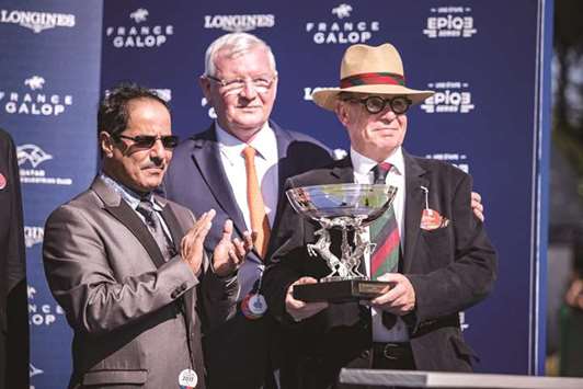 Qatar Racing and Equestrian Clubu2019s head of Racing section Abdulla Rashid al-Kubaisi (left) with the winners of the Qatar Derby des Pur-Sang Arabes de 4ans (Gr1 PA) in Chantilly yesterday. (Scoopdyga)
