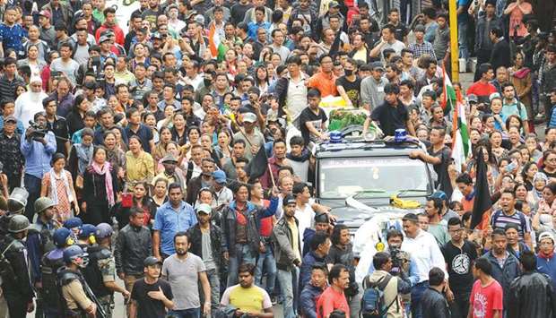 GJM supporters take part in a rally with the bodies of protesters that they had been killed during clashes with security forces a day earlier, in Darjeeling yesterday.