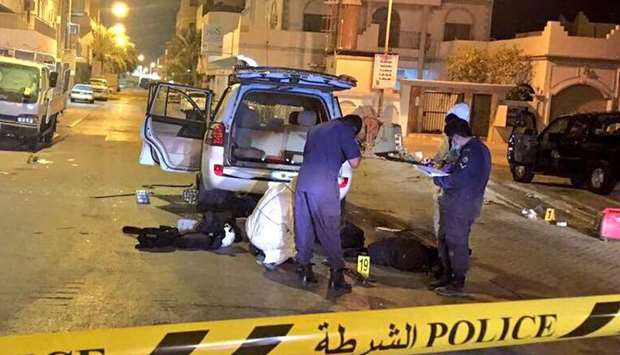 Police at the site of the terrorist bomb blast in Diraz