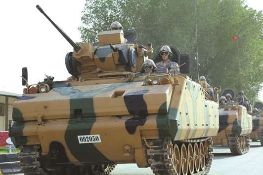 Turkish troops start their first military exercise yesterday at Tariq bin Ziyad battalion camp in Doha.