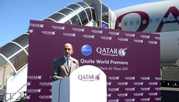 Qatar Airways CEO Akbar al-Baker speaks in front of a Qatar Airways Boeing 777 at Le Bourget airport, near Paris, on Monday.