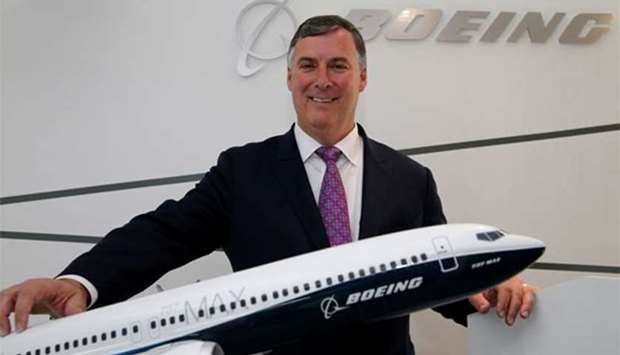 Boeing Commercial Airplanes President Kevin McAllister poses with a model of 737 MAX 10, during the 52nd Paris Air Show at Le Bourget Airport near Paris, on Tuesday.